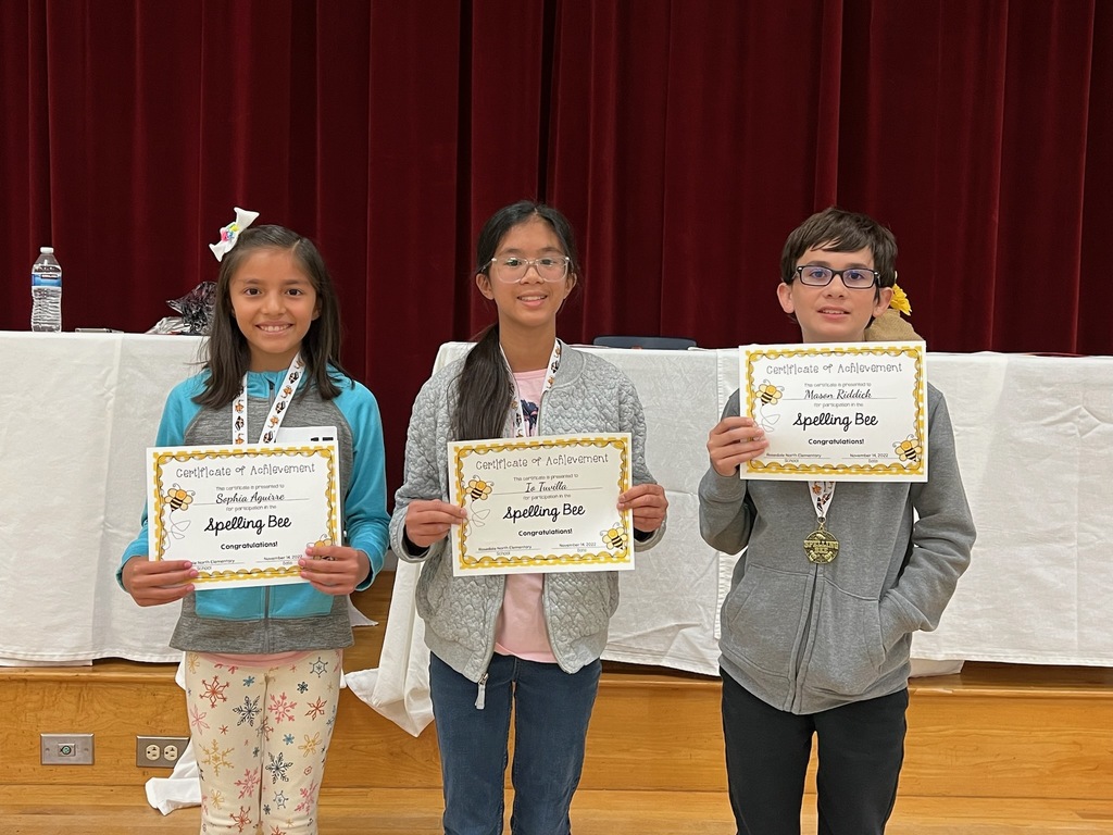 3 Students with Spelling Bee certificates