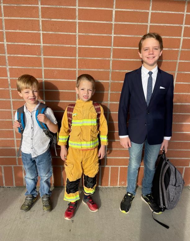 3 boys dressed in future careers 