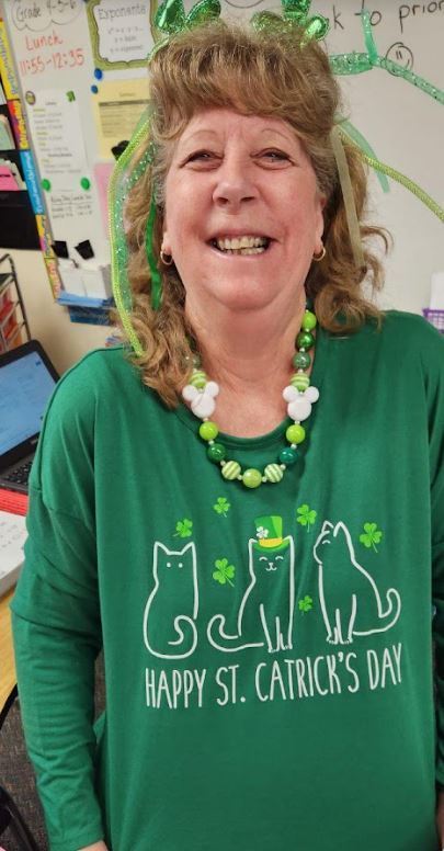 teacher with St. Patrick's Day outfit